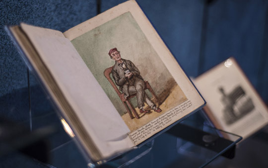 Book with picture of sitting man